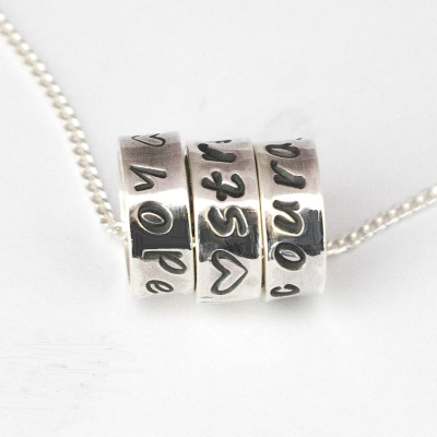 Personalised Mini Ring Pendant Necklace Crafted in Sterling Silver and Hand Stamped with Your Name, Words or Inspirations