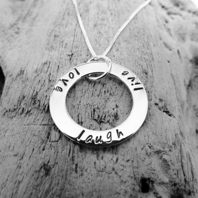 Sterling silver ring pendant with 'Live', 'Love', 'Laugh'.