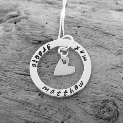 Sterling silver ring pendant with family names and a heart charm!