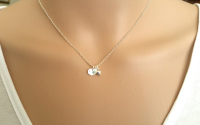 The Story Behind Our Sterling Silver Bird, Aqua & Heart Necklace | All Birthstone