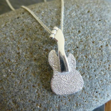 Music & Meaning: The Silver Guitar Pendant with Birthstone that Speaks to You