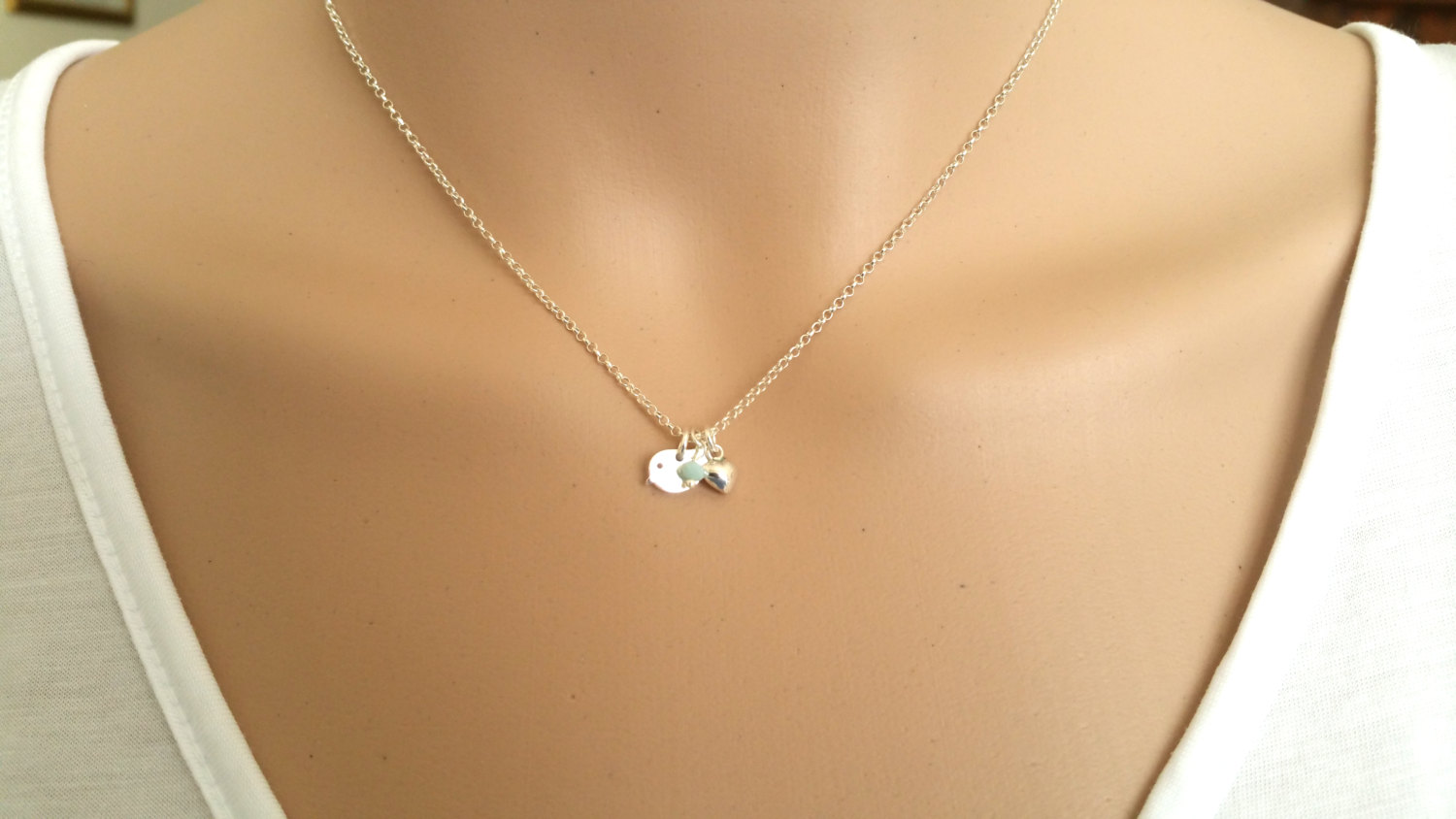 Tiny bird necklace, Sterling silver little bird, puff heart necklace with semi precious aqua  dangle